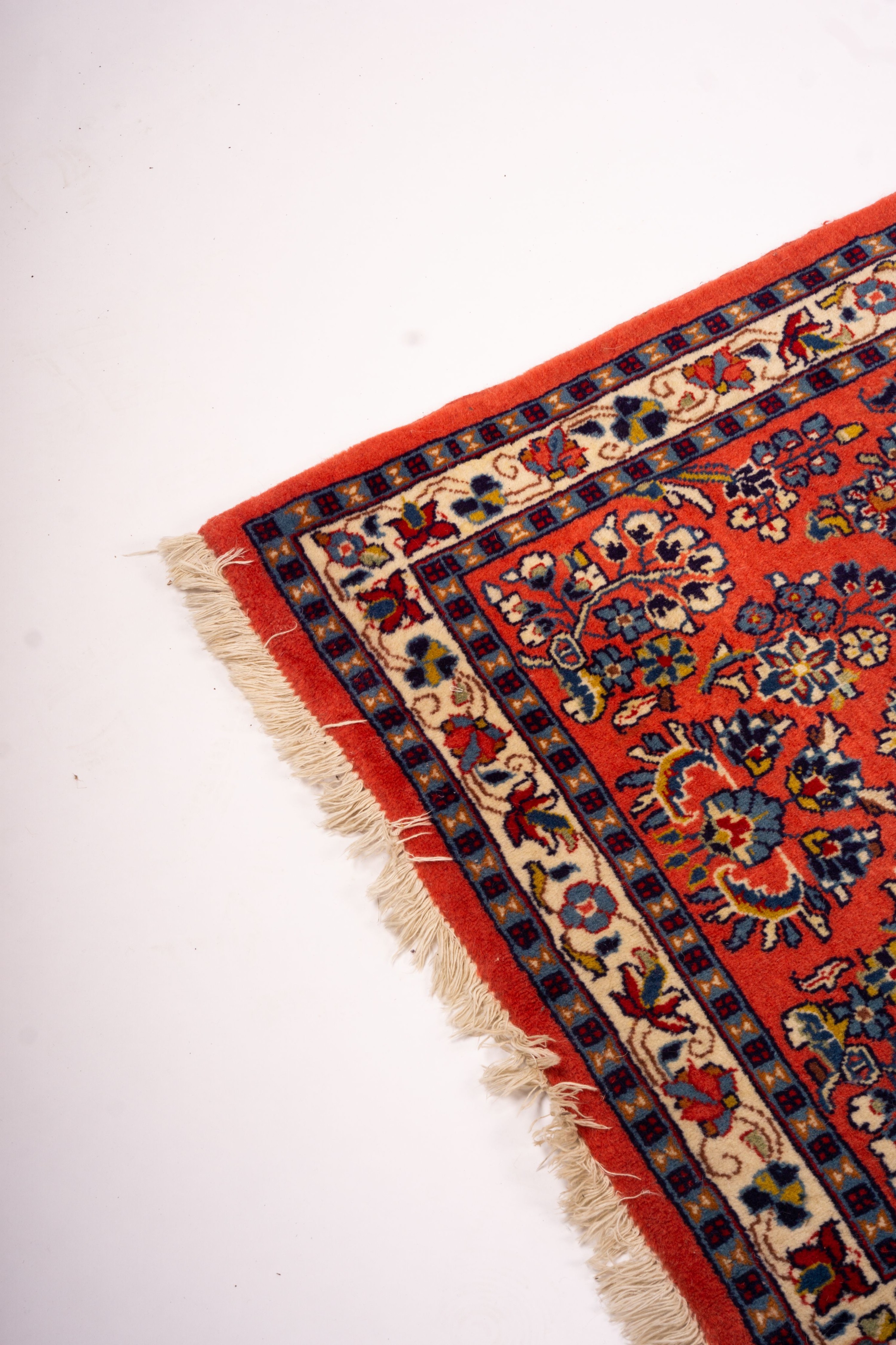 A Persian red ground runner, 202 x 83cm